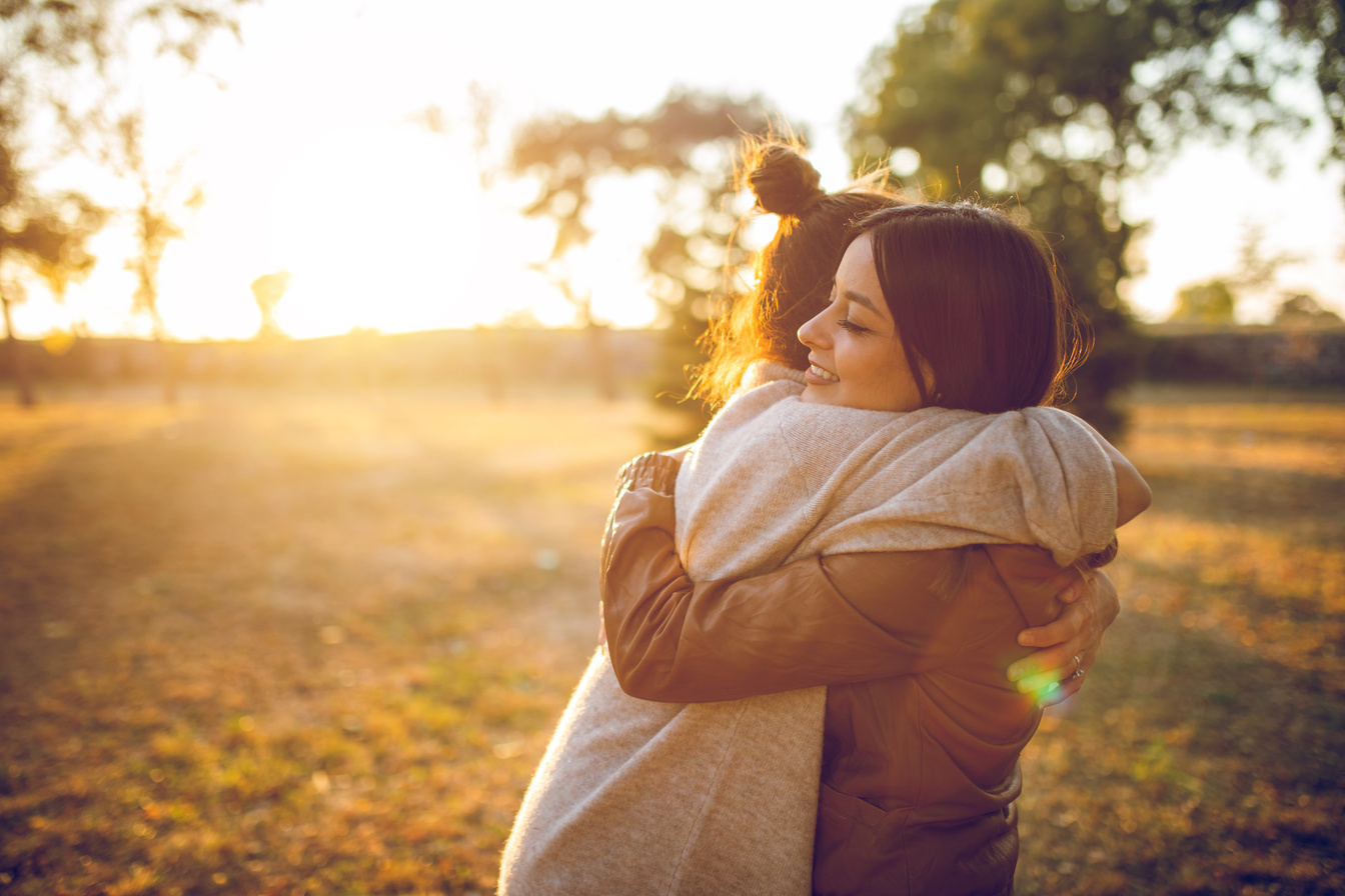 Two women hugging